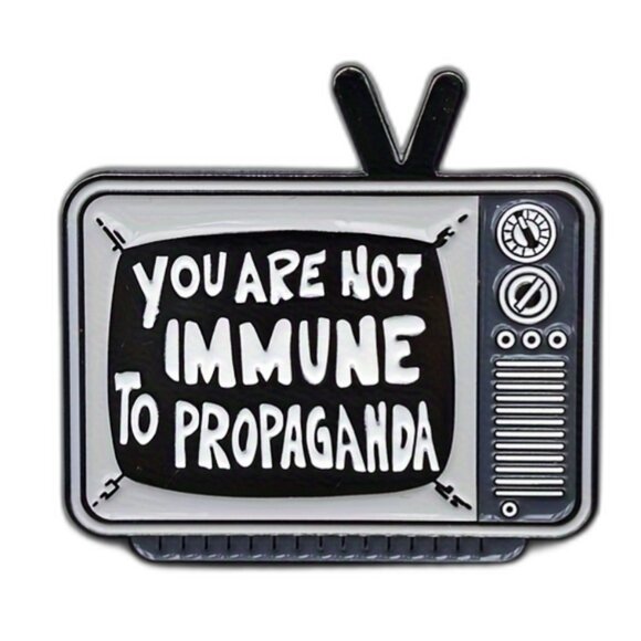 "YOU ARE NOT IMMUNE TO PROPAGANDA” ENAMEL PIN LAPEL PIN BROOCH NWT - Picture 1 of 15